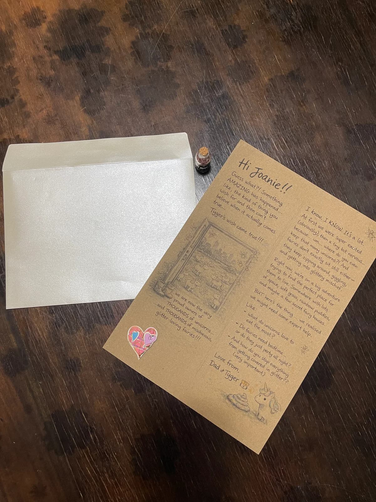 A real Wonderpunk letter on kraft paper with fairy dust bottle, sticker, and illustrated envelope
